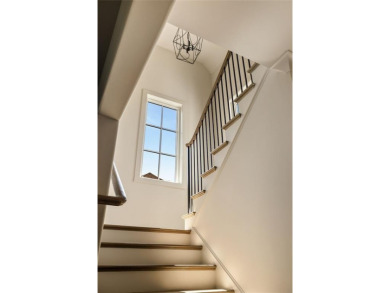 This exquisite new construction home is nestled on a quiet on The Governors Towne Club in Georgia - for sale on GolfHomes.com, golf home, golf lot