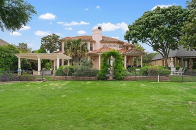 Welcome to this stunning Mediterranean-inspired retreat located on Hackberry Creek Country Club in Texas - for sale on GolfHomes.com, golf home, golf lot