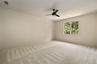 This exquisite new construction home is nestled on a quiet on The Governors Towne Club in Georgia - for sale on GolfHomes.com, golf home, golf lot