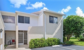 This newly renovated end-unit townhome lives like a on Hibiscus Golf Club in Florida - for sale on GolfHomes.com, golf home, golf lot