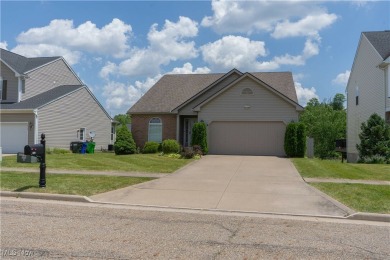 Welcome to this stunning 3-bedroom, 2.5-bathroom home perfectly on Boulder Creek Golf Club in Ohio - for sale on GolfHomes.com, golf home, golf lot