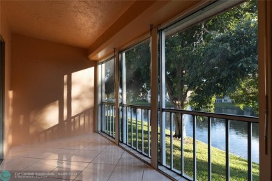 A breathtaking view and a peaceful living environment where life on Wynmoor Golf Course in Florida - for sale on GolfHomes.com, golf home, golf lot