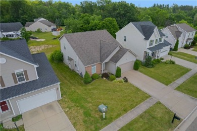 Welcome to this stunning 3-bedroom, 2.5-bathroom home perfectly on Boulder Creek Golf Club in Ohio - for sale on GolfHomes.com, golf home, golf lot