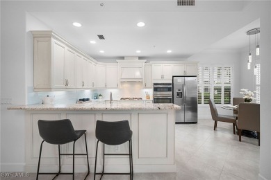 Experience this exceptional end-unit Coach Home, located within on Lely Resort Golf and Country Club in Florida - for sale on GolfHomes.com, golf home, golf lot