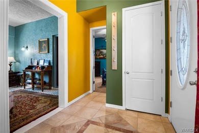 BEAUTIFUL 3 BEDROOM HOME WITH 2 1/2 BATHROOMS AND A BONUS on Valle Vista Golf Course in Arizona - for sale on GolfHomes.com, golf home, golf lot