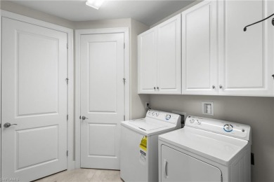 Searching for a modern-style coach home with a FULL GOLF on Esplanade Golf and  Country Club in Florida - for sale on GolfHomes.com, golf home, golf lot