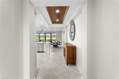 Searching for a modern-style coach home with a FULL GOLF on Esplanade Golf and  Country Club in Florida - for sale on GolfHomes.com, golf home, golf lot