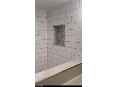Completely renovated end unit where salt life meets golf life! on Kelly Greens Golf and Country Club in Florida - for sale on GolfHomes.com, golf home, golf lot