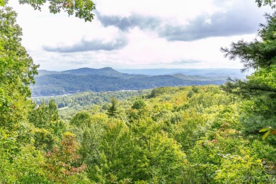 Exceptional lot in Lake Toxaway Estates with stunning views of on Lake Toxaway Country Club in North Carolina - for sale on GolfHomes.com, golf home, golf lot