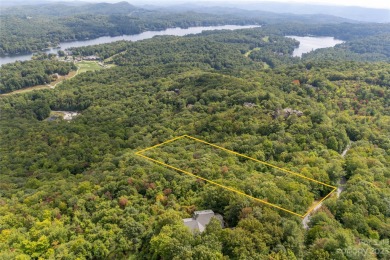 Exceptional lot in Lake Toxaway Estates with stunning views of on Lake Toxaway Country Club in North Carolina - for sale on GolfHomes.com, golf home, golf lot