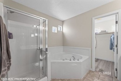 This gorgeous townhome sits right off the golf course and has on The Oasis Golf Club in Nevada - for sale on GolfHomes.com, golf home, golf lot