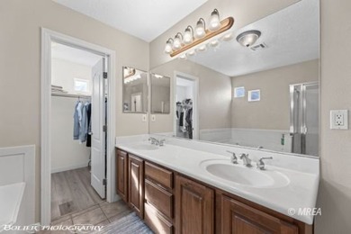 This gorgeous townhome sits right off the golf course and has on The Oasis Golf Club in Nevada - for sale on GolfHomes.com, golf home, golf lot