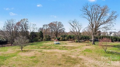 Introducing a masterpiece by one of the city's premier builders on  in North Carolina - for sale on GolfHomes.com, golf home, golf lot