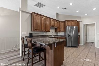 This gorgeous townhome sits right off the golf course and has on The Oasis Golf Club in Nevada - for sale on GolfHomes.com, golf home, golf lot