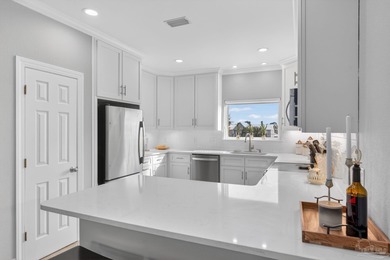 RARE DEEP WATERFRONT HOME ON MARINA ROAD IN Orange Beach - NO on Orange Beach Golf Center in Alabama - for sale on GolfHomes.com, golf home, golf lot