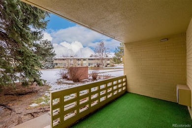 Step into this move in ready ground level condo in the heart of on Emerald Greens Golf Club in Colorado - for sale on GolfHomes.com, golf home, golf lot