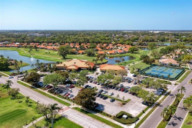 This beautiful 2-bedroom, 2-bathroom w/den home in the Peridia on Peridia Golf and Country Club in Florida - for sale on GolfHomes.com, golf home, golf lot