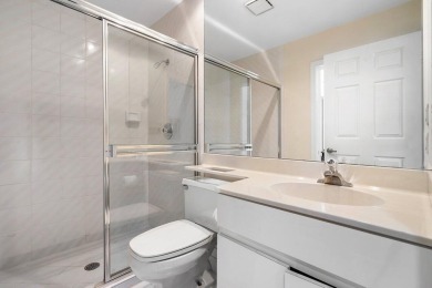 Spectacular golf course views from this 2-bedroom, 3.5-bath home on Boca Woods Country Club in Florida - for sale on GolfHomes.com, golf home, golf lot