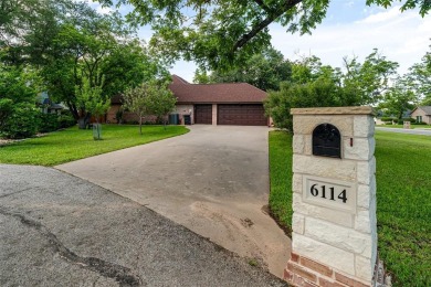 PECAN PLANTATION GEM nestled among mature trees on oversized lot on Pecan Plantation Country Club in Texas - for sale on GolfHomes.com, golf home, golf lot