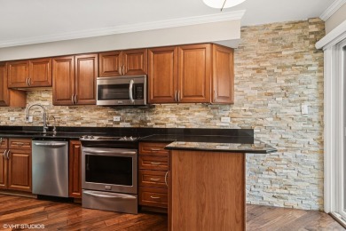Serene waterfront townhome overlooking the 11th and 12th on Pine Meadow Golf Club in Illinois - for sale on GolfHomes.com, golf home, golf lot