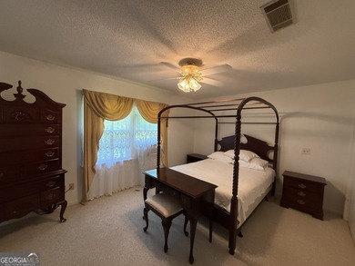 Nestled on over half an acre in a quiet cul-de-sac. this on Forest Heights Country Club in Georgia - for sale on GolfHomes.com, golf home, golf lot