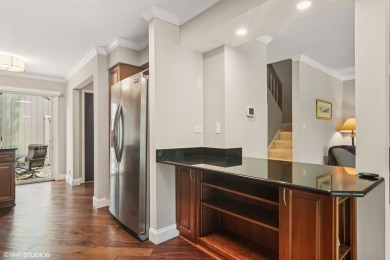 Serene waterfront townhome overlooking the 11th and 12th on Pine Meadow Golf Club in Illinois - for sale on GolfHomes.com, golf home, golf lot