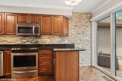 Serene waterfront townhome overlooking the 11th and 12th on Pine Meadow Golf Club in Illinois - for sale on GolfHomes.com, golf home, golf lot