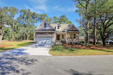 This is it! This 2024 Parade of Homes award winning residence on Lockwood Folly Country Club in North Carolina - for sale on GolfHomes.com, golf home, golf lot