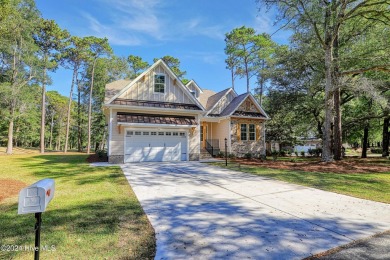 This is it! This 2024 Parade of Homes award winning residence on Lockwood Folly Country Club in North Carolina - for sale on GolfHomes.com, golf home, golf lot