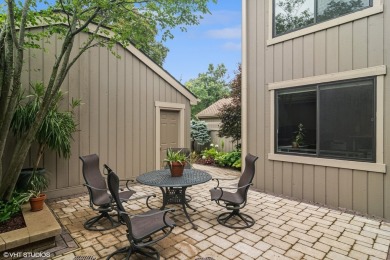 Serene waterfront townhome overlooking the 11th and 12th on Pine Meadow Golf Club in Illinois - for sale on GolfHomes.com, golf home, golf lot