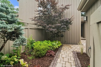 Serene waterfront townhome overlooking the 11th and 12th on Pine Meadow Golf Club in Illinois - for sale on GolfHomes.com, golf home, golf lot