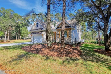 This is it! This 2024 Parade of Homes award winning residence on Lockwood Folly Country Club in North Carolina - for sale on GolfHomes.com, golf home, golf lot