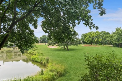 Serene waterfront townhome overlooking the 11th and 12th on Pine Meadow Golf Club in Illinois - for sale on GolfHomes.com, golf home, golf lot