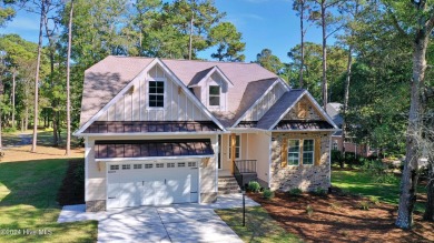 This is it! This 2024 Parade of Homes award winning residence on Lockwood Folly Country Club in North Carolina - for sale on GolfHomes.com, golf home, golf lot