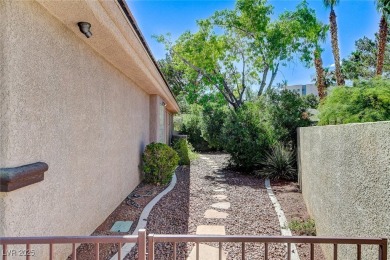 THIS IS THE 'SUMMERLIN' SINGLE STORY GEM YOUR CLIENTS MAY BE on TPC Las Vegas in Nevada - for sale on GolfHomes.com, golf home, golf lot