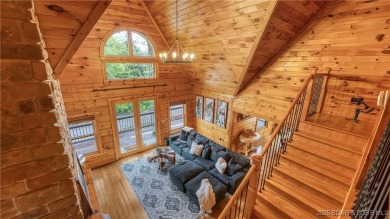 Step into the charm of true log home living in the prestigious on The Club At Old Kinderhook in Missouri - for sale on GolfHomes.com, golf home, golf lot