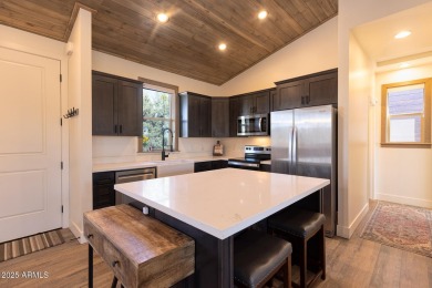 Nestled in the heart of Bison Pass, this stunning 2-bedroom on Torreon Golf Club in Arizona - for sale on GolfHomes.com, golf home, golf lot
