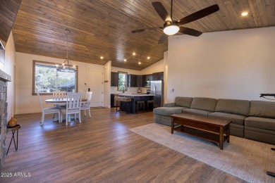 Nestled in the heart of Bison Pass, this stunning 2-bedroom on Torreon Golf Club in Arizona - for sale on GolfHomes.com, golf home, golf lot