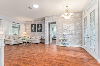 GOLF COURSE home with tons of updates and upgrades located in on Eagle Ridge At Spruce Creek Country Club in Florida - for sale on GolfHomes.com, golf home, golf lot