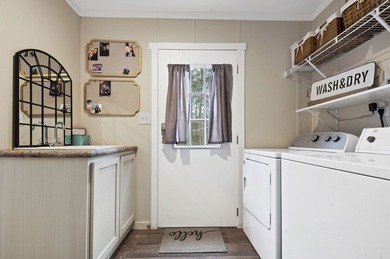 Modern Elegance meets Southern Comfort in this pristine 2022 on Rayburn Country Club in Texas - for sale on GolfHomes.com, golf home, golf lot