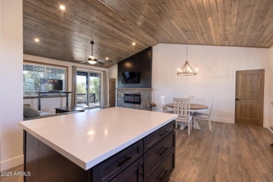 Nestled in the heart of Bison Pass, this stunning 2-bedroom on Torreon Golf Club in Arizona - for sale on GolfHomes.com, golf home, golf lot
