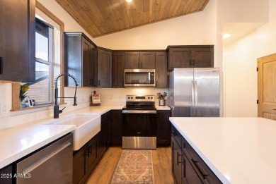 Nestled in the heart of Bison Pass, this stunning 2-bedroom on Torreon Golf Club in Arizona - for sale on GolfHomes.com, golf home, golf lot