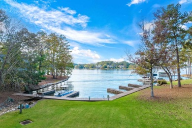 Charming lake access home situated on a unique lot that offers on Reynolds Lake Oconee - The Oconee in Georgia - for sale on GolfHomes.com, golf home, golf lot