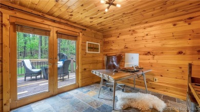 Step into the charm of true log home living in the prestigious on The Club At Old Kinderhook in Missouri - for sale on GolfHomes.com, golf home, golf lot
