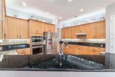 GOLF COURSE home with tons of updates and upgrades located in on Eagle Ridge At Spruce Creek Country Club in Florida - for sale on GolfHomes.com, golf home, golf lot