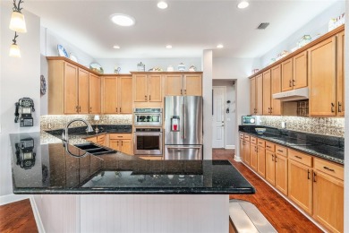 GOLF COURSE home with tons of updates and upgrades located in on Eagle Ridge At Spruce Creek Country Club in Florida - for sale on GolfHomes.com, golf home, golf lot