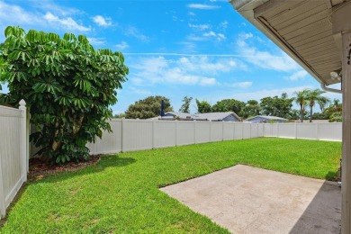 Welcome to your slice of paradise in the coastal city of Largo! on Largo Golf Course in Florida - for sale on GolfHomes.com, golf home, golf lot