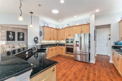 GOLF COURSE home with tons of updates and upgrades located in on Eagle Ridge At Spruce Creek Country Club in Florida - for sale on GolfHomes.com, golf home, golf lot
