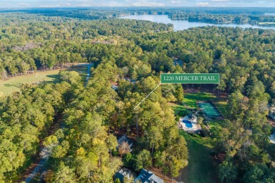 Charming lake access home situated on a unique lot that offers on Reynolds Lake Oconee - The Oconee in Georgia - for sale on GolfHomes.com, golf home, golf lot