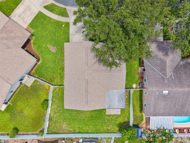 Welcome to your slice of paradise in the coastal city of Largo! on Largo Golf Course in Florida - for sale on GolfHomes.com, golf home, golf lot
